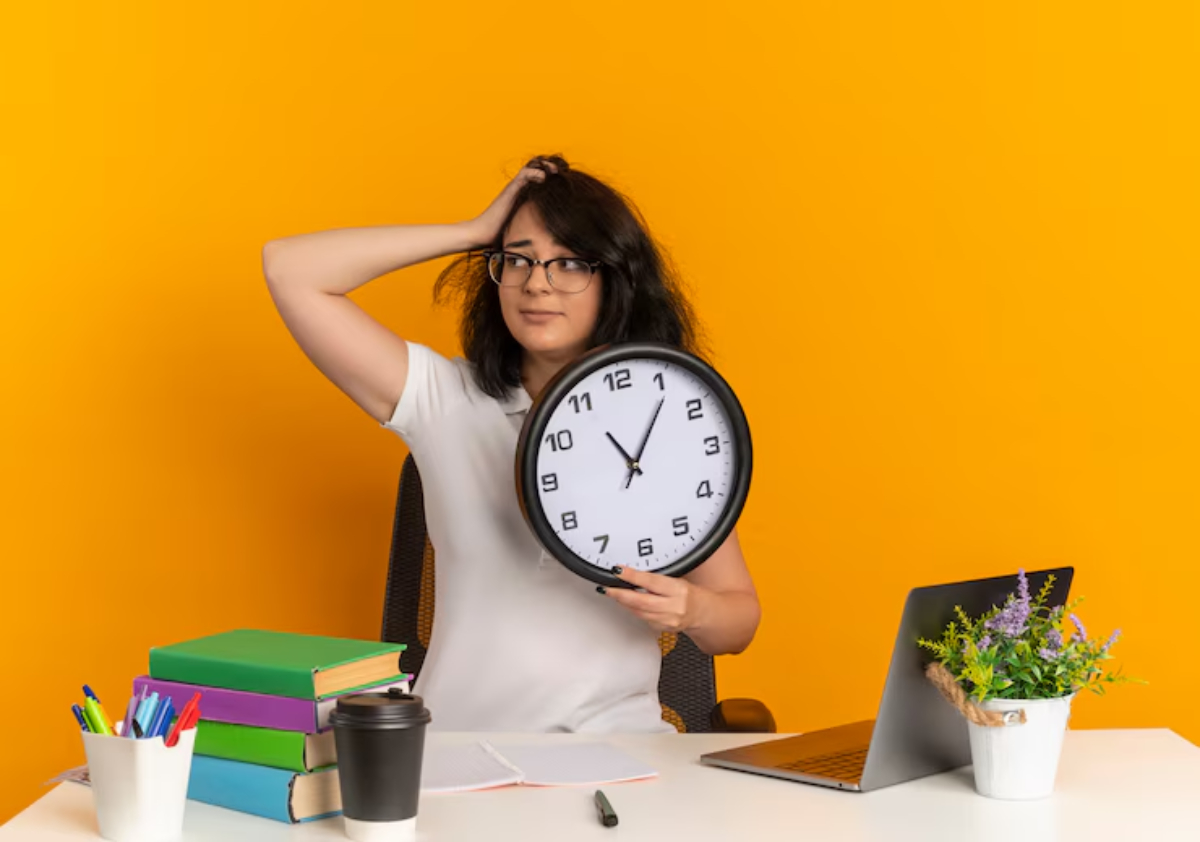 A person holding a clock shows concern while surrounded by books, a coffee cup, and a laptop on a bright yellow background.